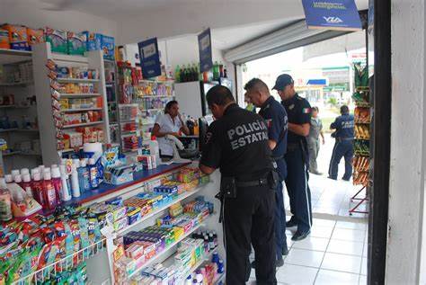 Con pistola en mano, sujeto asalta Farmacia Similares en Amozoc